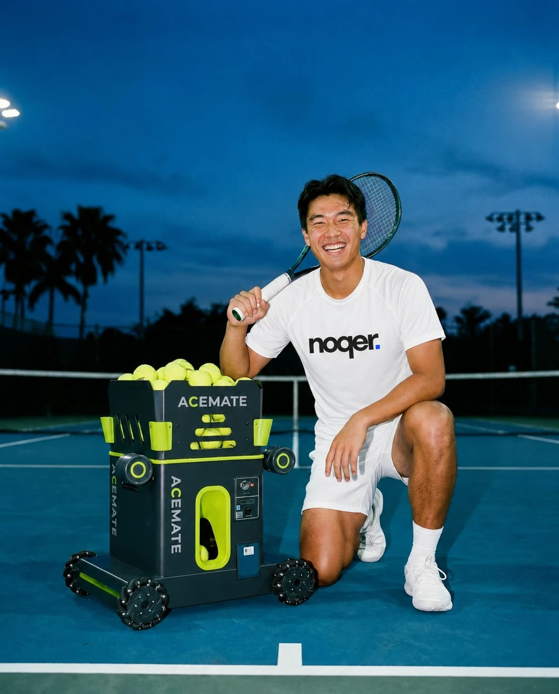 A tennis player in a noqer shirt beside AceMate S10 on court